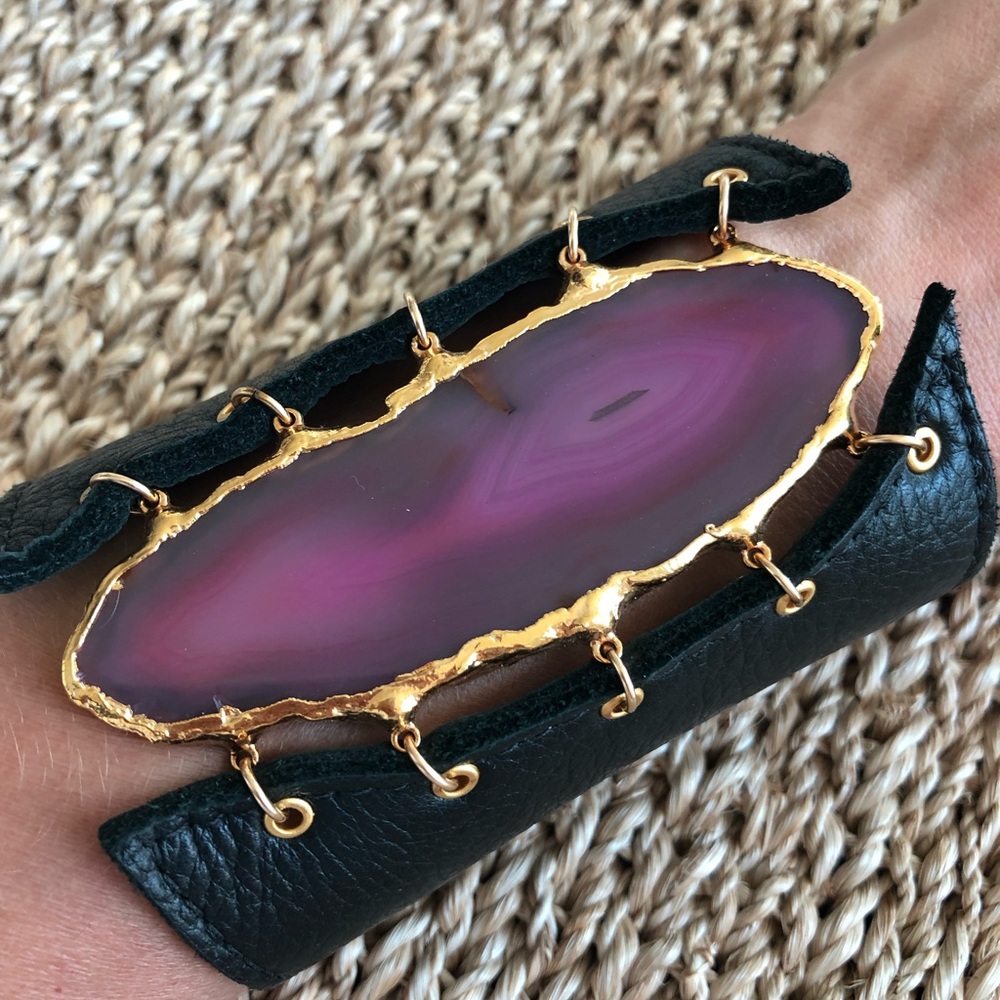 Gorgeous black leather and fuscia agate cuff.